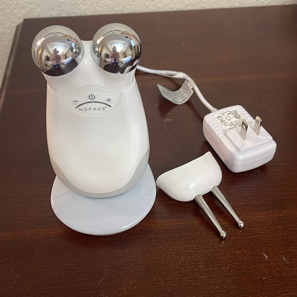 Nuface Trinity Microcurrent facial toning device.